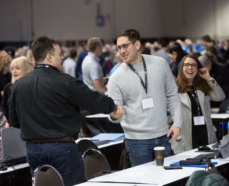 Rule #1 Investment Workshop students shaking hands